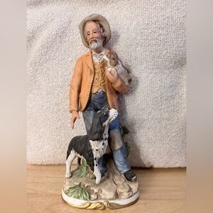 Vintage Figurine of Man with Dog and Puppy